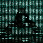 Hacker in data security concept. Hacker using laptop. Hacking the Internet. Cyber attack.