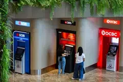 The three local banks ended mixed on Thursday.