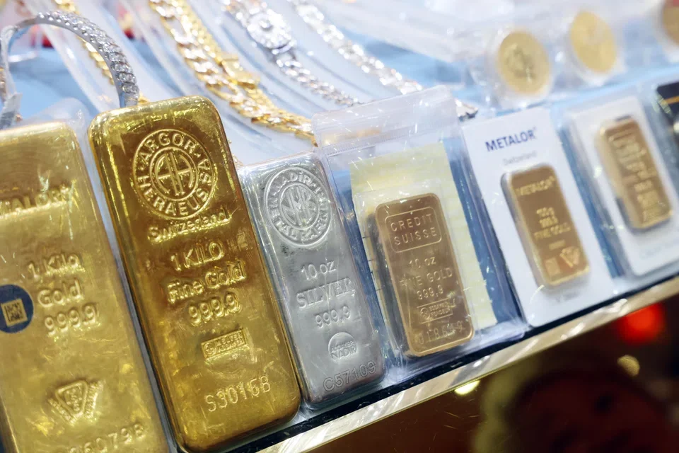 Bullion dropped as much as 0.6% after shedding almost twice that in the previous session.