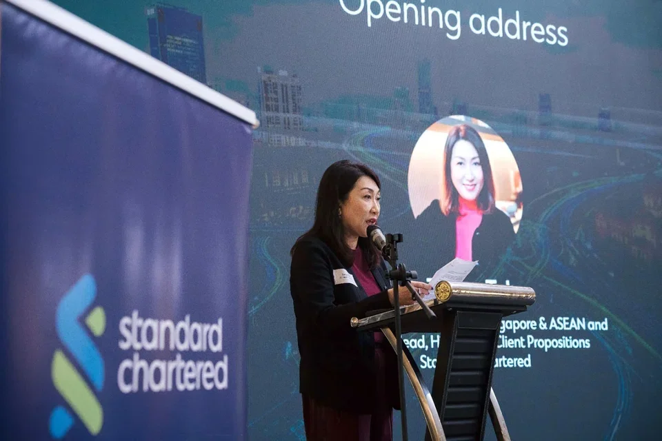 Standard Chartered’s Teresa Tah says SMEs expanding across the border needed support beyond financing, including in local market knowledge and links to business-service partners.
