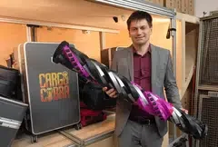 Dominik Braun, CEO of Antomation, is seeking to patent his company’s extendable roller system that can stow and retrieve luggage in airliners.