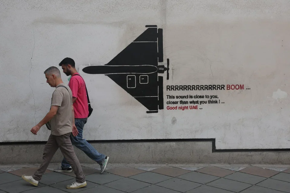 A mural depicts an Iranian drone on a street in Teheran, which is said to be considering the new peace proposal, with a response expected by the end of the week.